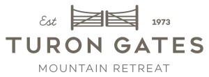 Turon Gates Mountain Retreat logo with rustic elements and a classic gate illustration